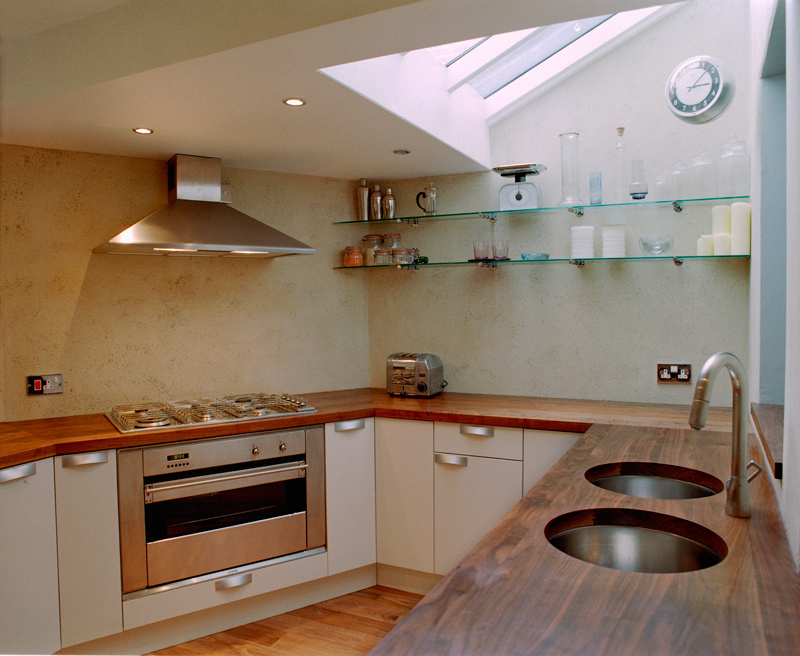 Modern kitchen with dual sinks and Duropal natural grain worktops